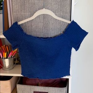 blue over-the-shoulder crop